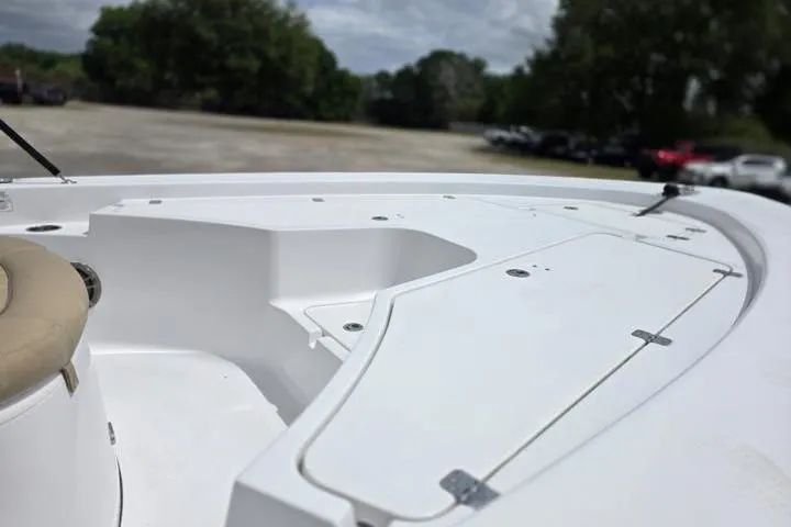 Slide: The Image of 2016 Sportmans Masters 227 Bay Boat deck, featuring sleek design and ample storage space. - 10