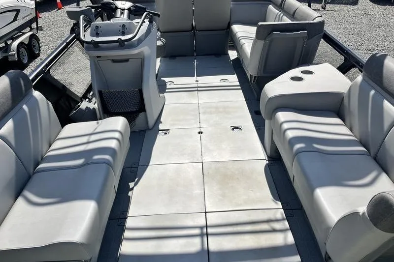 Slide: The Image of Interior of 2022 Sea-Doo Switch Cruise 21 pontoon boat with spacious seating arrangement. - 7