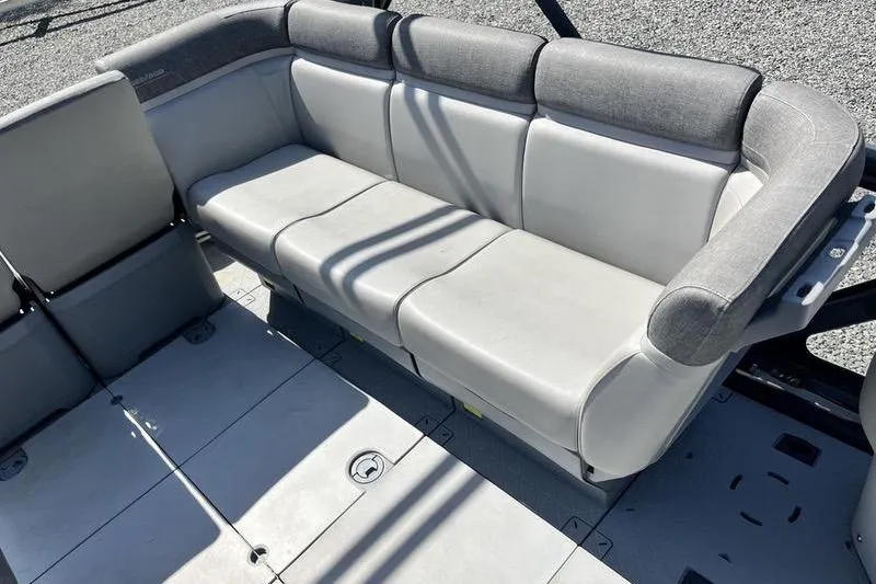 Slide: The Image of 2022 Sea-Doo Switch Cruise 21 interior seating with gray upholstery. - 9