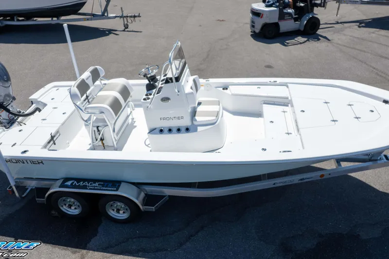 Slide: The Image of 2025 Frontier 2104 boat on trailer, featuring spacious deck and seating. - 19