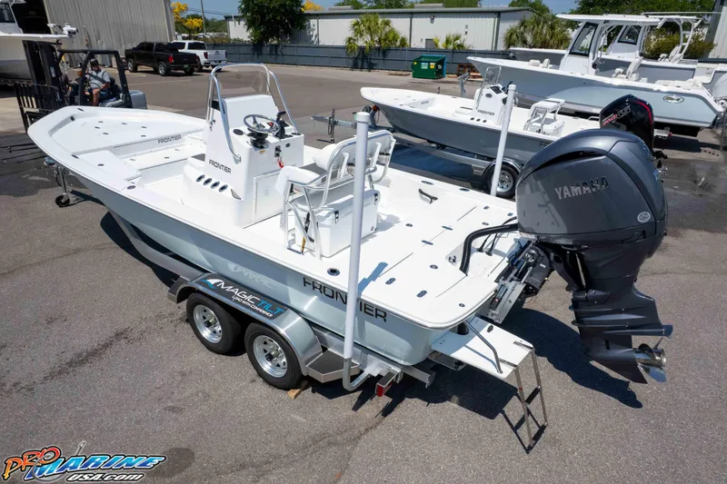 Slide: The Image of 2025 Frontier 2104 boat with Yamaha engine on trailer in outdoor setting. - 11