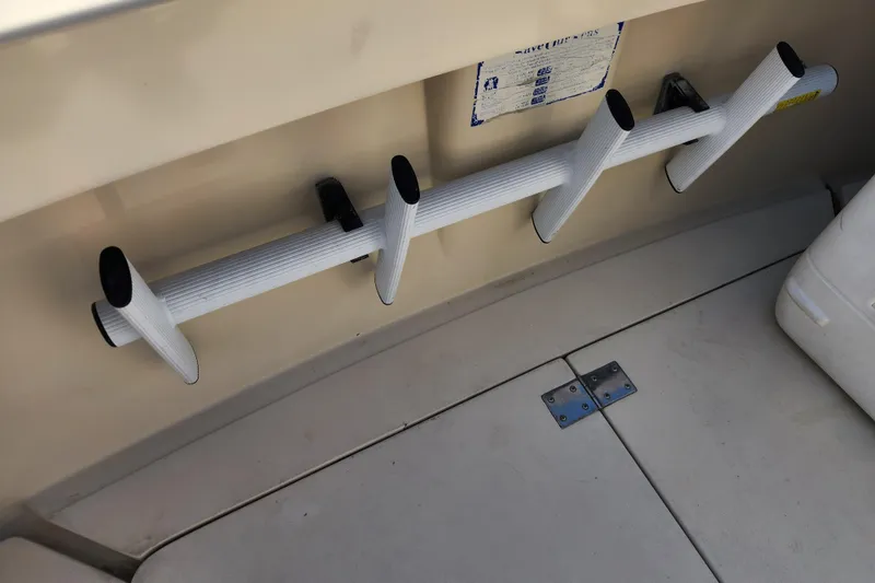 Slide: The Image of Rod holders on 1987 Luhrs 40 Convertible boat deck, showcasing fishing equipment storage. - 37