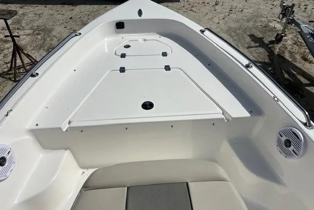 Slide: The Image of 2025 Key West 1720 Center Console boat interior with storage compartments and seating. - 8