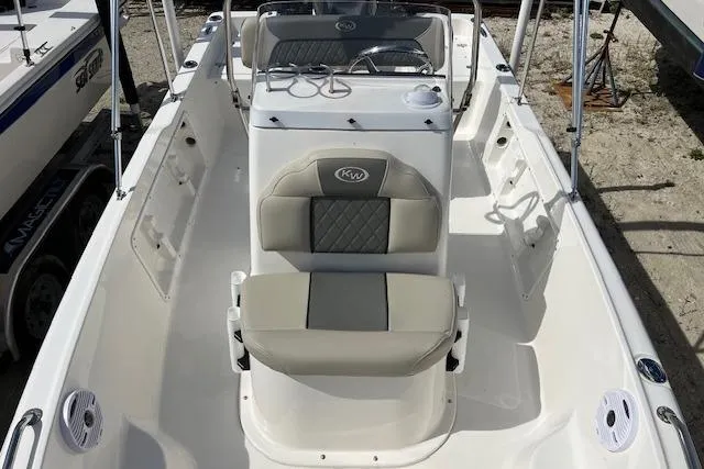 Slide: The Image of 2025 Key West 1720 Center Console boat with sleek seating and modern design. - 9