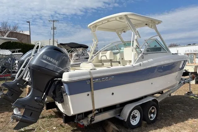 Slide: The Image of 2023 World Cat 230 DC boat on trailer with Yamaha outboard motor. - 11
