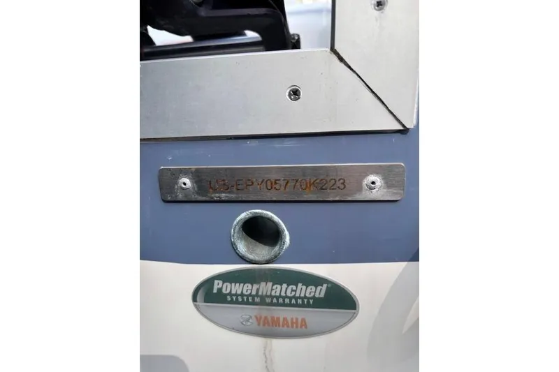 Slide: The Image of 2023 World Cat 230 DC boat with Yamaha PowerMatched warranty label and serial number plate. - 14