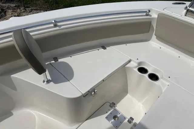 Slide: The Image of 2021 Key West 239 FS boat interior with seating and cup holders. - 10