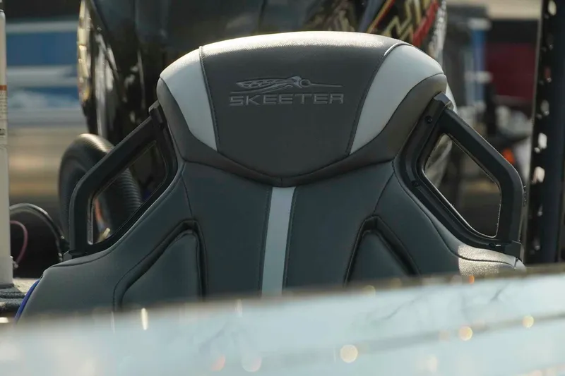 Slide: The Image of 2026 Skeeter ZXE21 boat seat with logo, showcasing sleek design and comfort. - 17