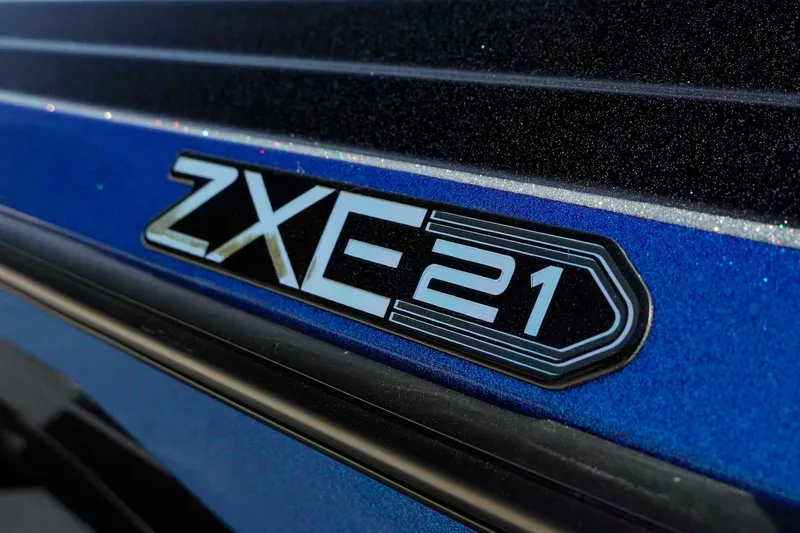 Slide: The Image of 2026 Skeeter ZXE21 logo on a blue metallic surface. - 27