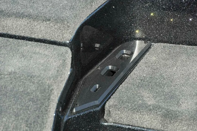 Slide: The Image of Carpeted interior detail of 2026 Skeeter ZXE21 boat with metallic accents. - 30