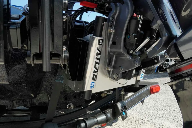 Slide: The Image of Close-up of 2026 Skeeter ZXE21 boat engine components and Atlas CL jack plate. - 9