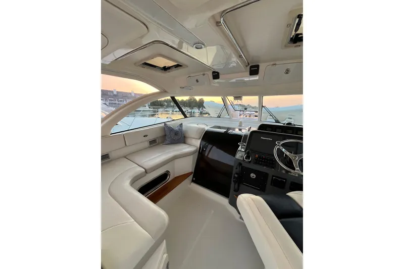 Slide: The Image of Luxurious interior of 2009 Pursuit OS 375 Offshore yacht with modern helm and seating. - 20
