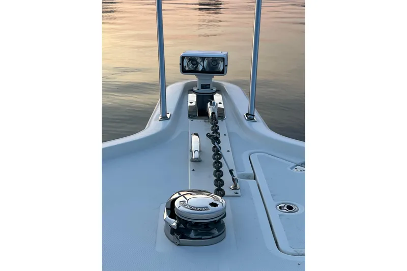 Slide: The Image of Bow of 2009 Pursuit OS 375 Offshore boat with anchor chain and spotlight. - 37