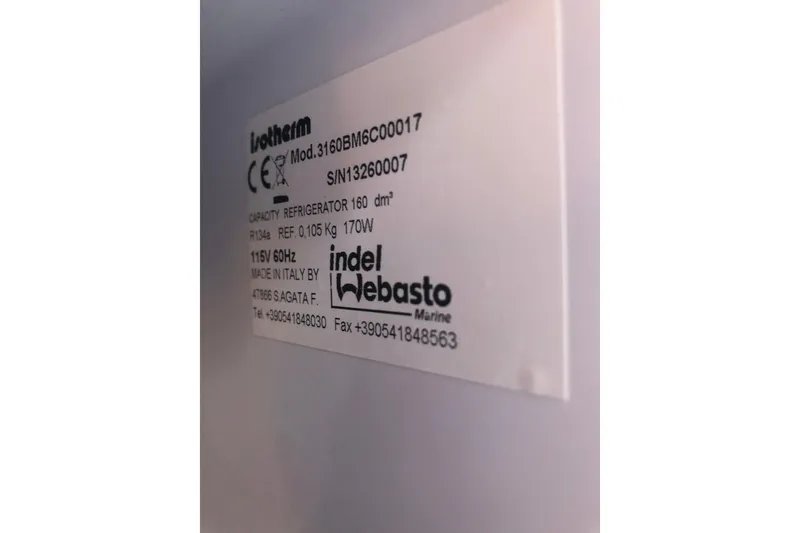 Slide: The Image of Label on Isotherm refrigerator, model 3160BM6C00017, showing specifications and contact details. - 42