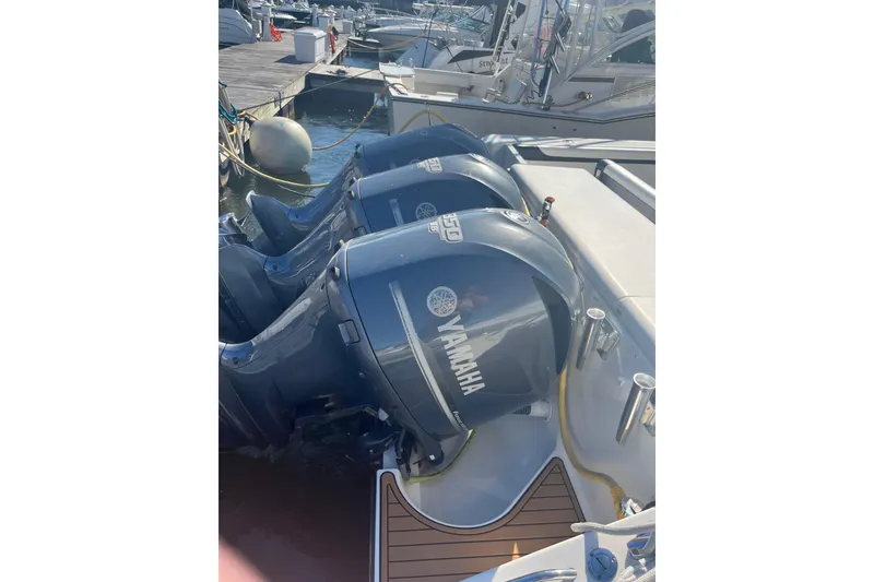 Slide: The Image of 2009 Pursuit OS 375 Offshore with Yamaha outboard engines at dock. - 8