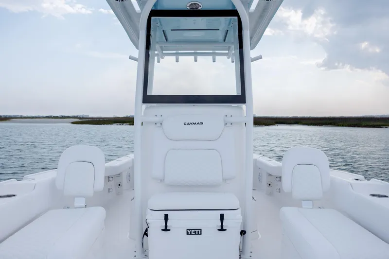 Slide: The Image of Interior view of Caymas 24 HB 2026 boat on the water. - 18