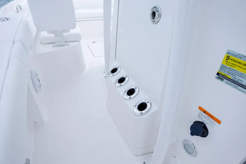 Slide: The Image of Interior of 2026 Caymas 24 HB with seating and cup holders. - 25