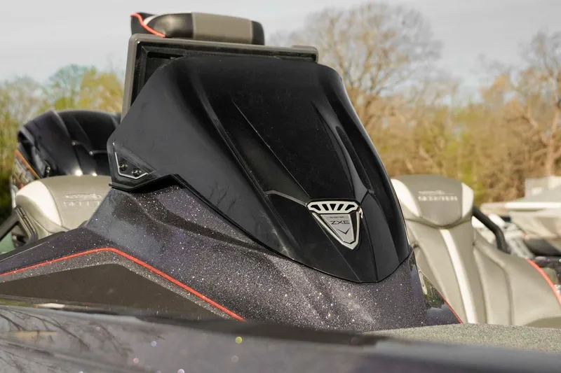 Slide: The Image of 2026 Skeeter ZXE20 boat console with sleek black design and logo detail. - 12