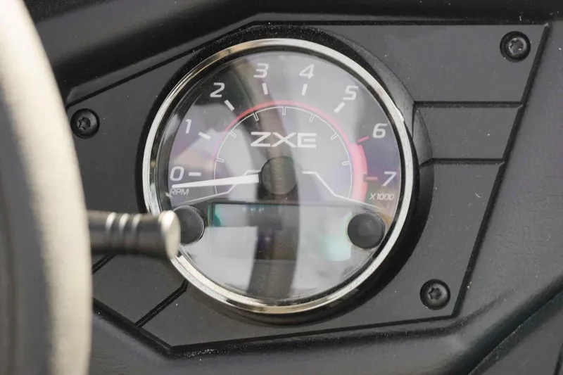 Slide: The Image of Close-up of 2026 Skeeter ZXE20 tachometer displaying RPM gauge. - 15