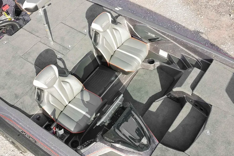 Slide: The Image of Interior of 2026 Skeeter ZXE20 boat with dual seats and carpeted flooring. - 20