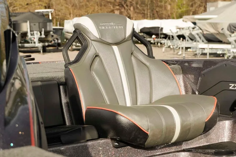 Slide: The Image of Skeeter ZXE20 2026 boat seat with sleek design and comfortable padding. - 23