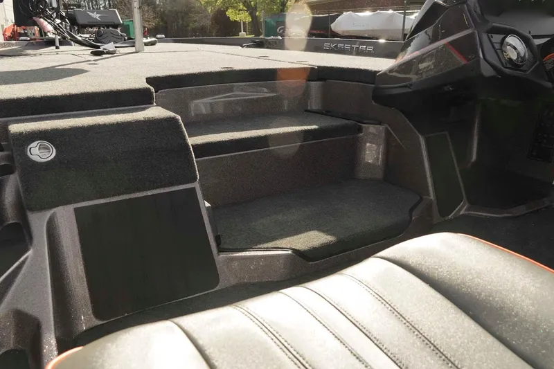 Slide: The Image of Interior of 2026 Skeeter ZXE20 boat, featuring seating and control panel. - 25