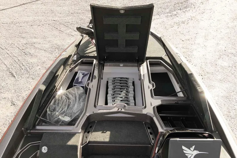 Slide: The Image of 2026 Skeeter ZXE20 boat interior with open storage compartments and organized layout. - 29