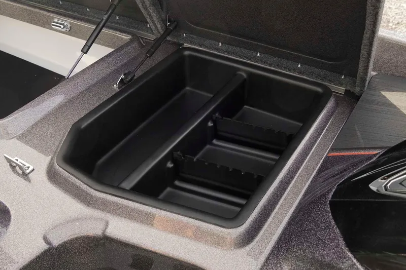 Slide: The Image of Open storage compartment in 2026 Skeeter ZXE20 boat, showcasing organized interior space. - 32
