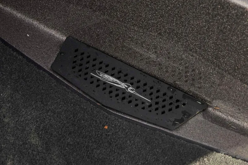 Slide: The Image of 2026 Skeeter ZXE20 boat interior with textured flooring and branded vent cover. - 34