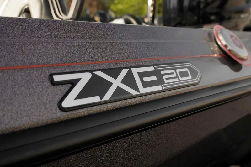 Slide: The Image of Close-up of 2026 Skeeter ZXE20 model emblem on a sleek, metallic surface. - 49