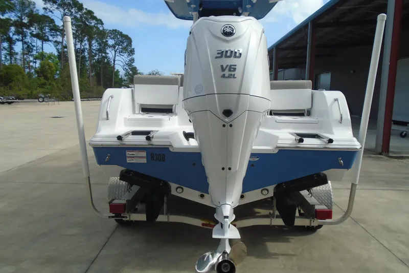 Slide: The Image of 2024 Sportsman Heritage 231 Center Console boat with Yamaha V6 engine on trailer. - 4