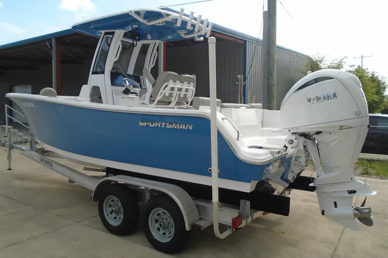 Slide: The Image of 2024 Sportsman Heritage 231 Center Console boat with Yamaha engine on trailer. - 7