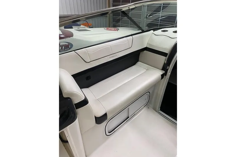Slide: The Image of 2020 Formula 350 Sun Sport boat interior with white seating and sleek design. - 10