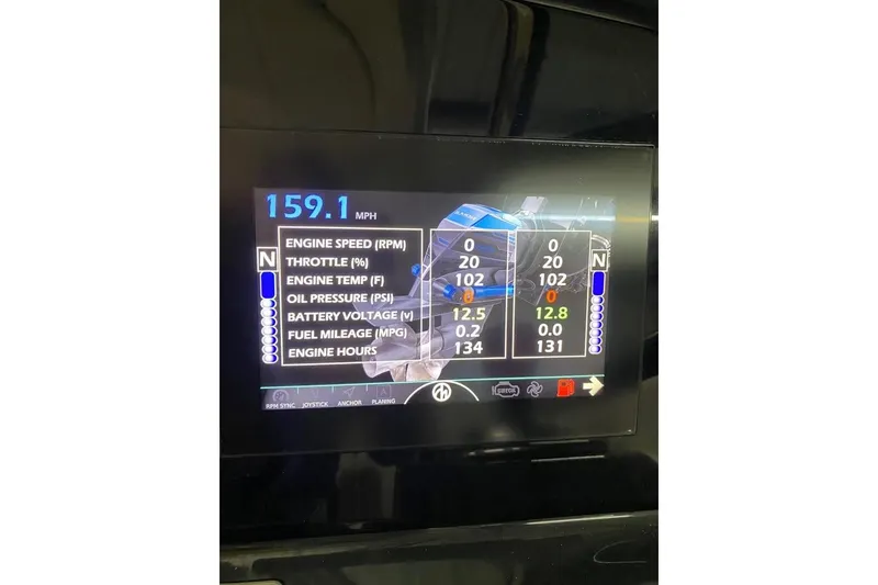 Slide: The Image of Dashboard display of a 2020 Formula 350 Sun Sport showing engine metrics and speed. - 14