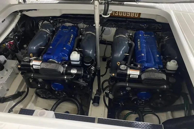 Slide: The Image of Twin engines in a 2020 Formula 350 Sun Sport boat, showcasing powerful marine engineering. - 20