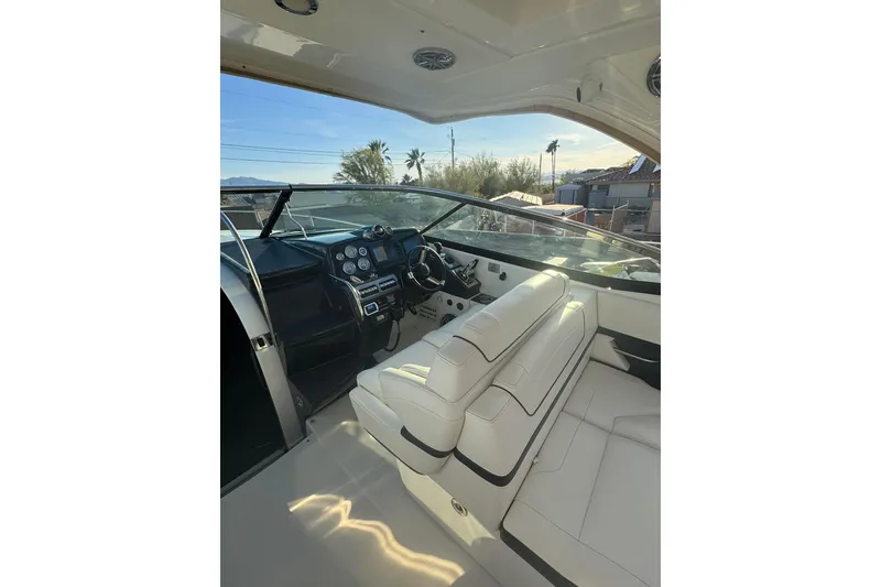 Slide: The Image of Interior of a 2020 Formula 350 Sun Sport boat with sleek dashboard and seating. - 6