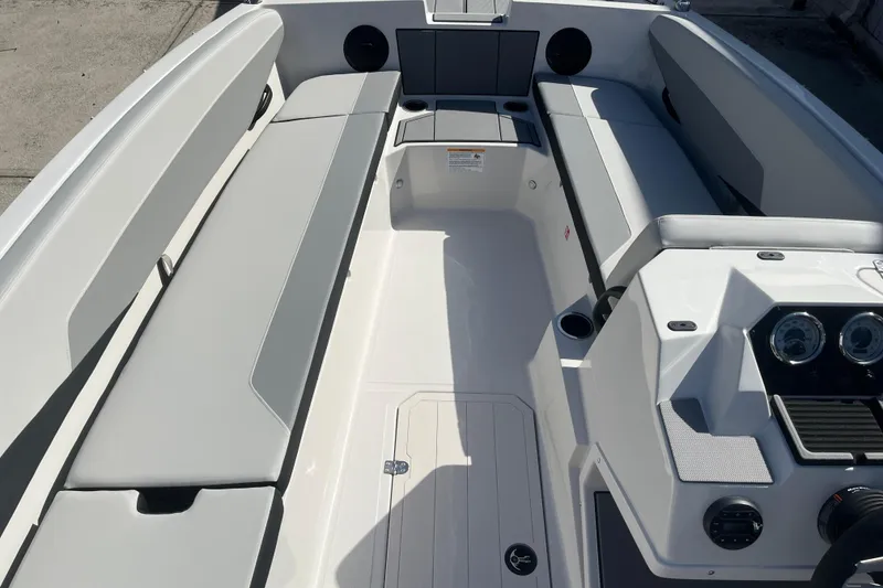 Slide: The Image of 2026 Starcraft SV 18 OB boat interior with spacious seating and modern dashboard. - 10