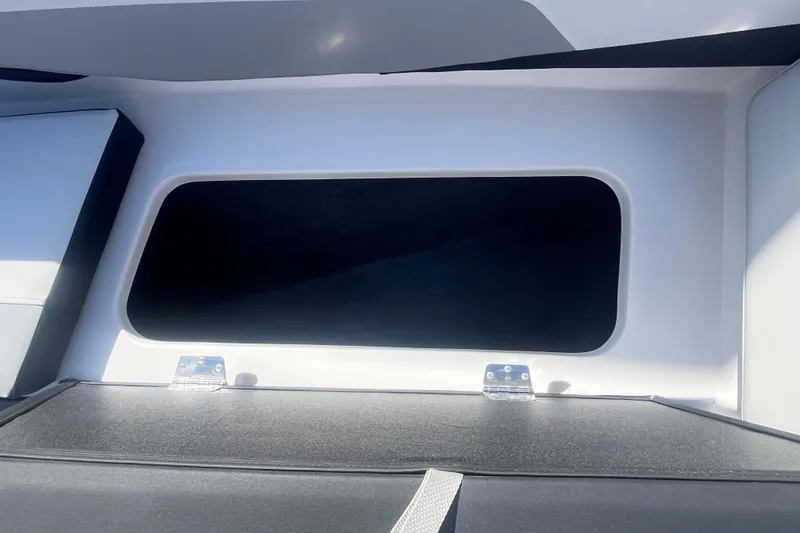Slide: The Image of Interior view of 2026 Starcraft SV 18 OB boat storage compartment. - 12