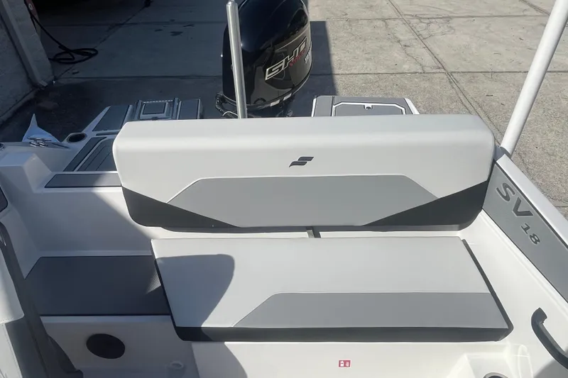 Slide: The Image of 2026 Starcraft SV 18 OB boat interior with sleek seating and modern design. - 17