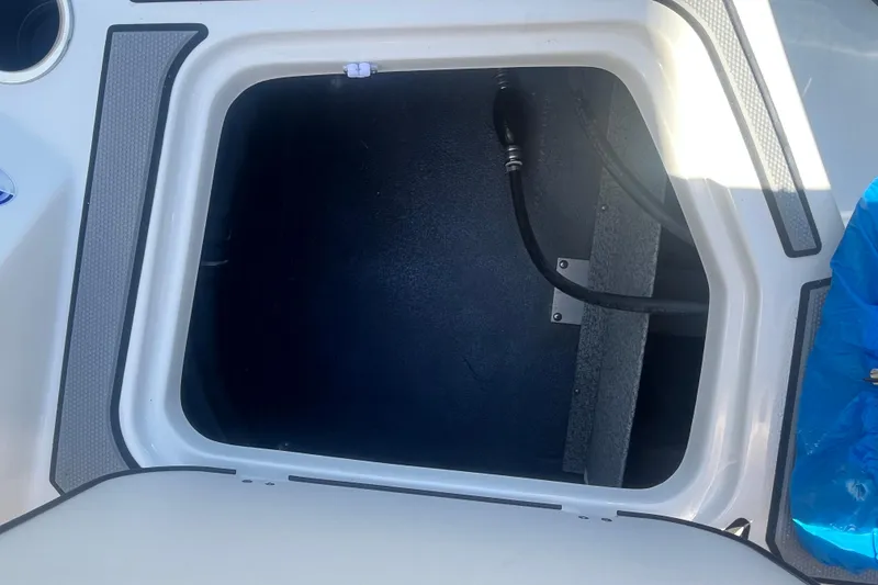 Slide: The Image of Open storage compartment on 2026 Starcraft SV 18 OB boat. - 20