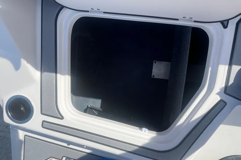 Slide: The Image of Storage compartment of 2026 Starcraft SV 18 OB boat, featuring sleek design and ample space. - 21