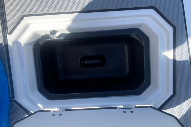 Slide: The Image of Storage compartment on a 2026 Starcraft SV 18 OB boat, open and empty. - 22