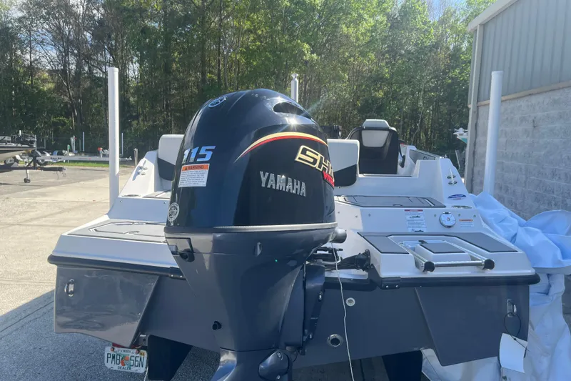 Slide: The Image of 2026 Starcraft SV 18 OB boat with Yamaha 115 engine, parked outdoors. - 9