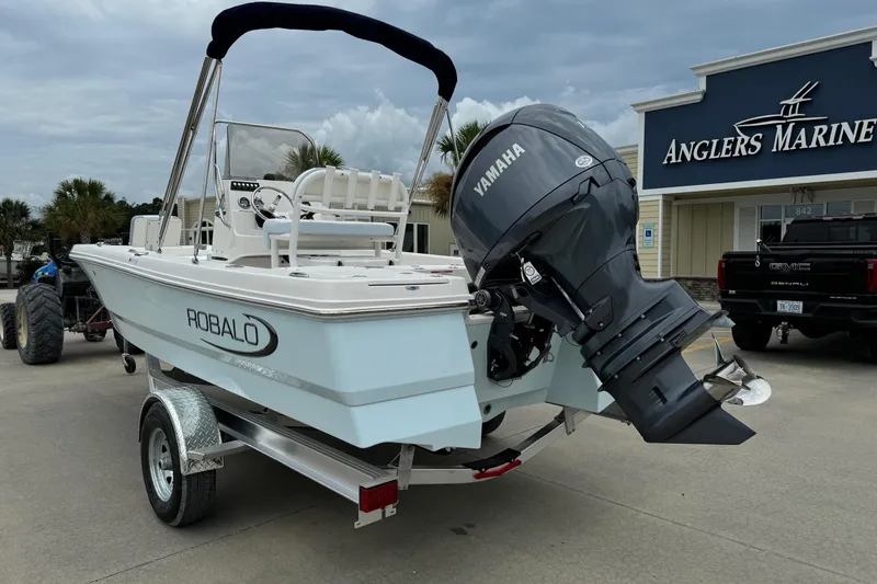 Slide: The Image of 2026 Robalo 206 Cayman boat with Yamaha engine at Anglers Marine dealership. - 2