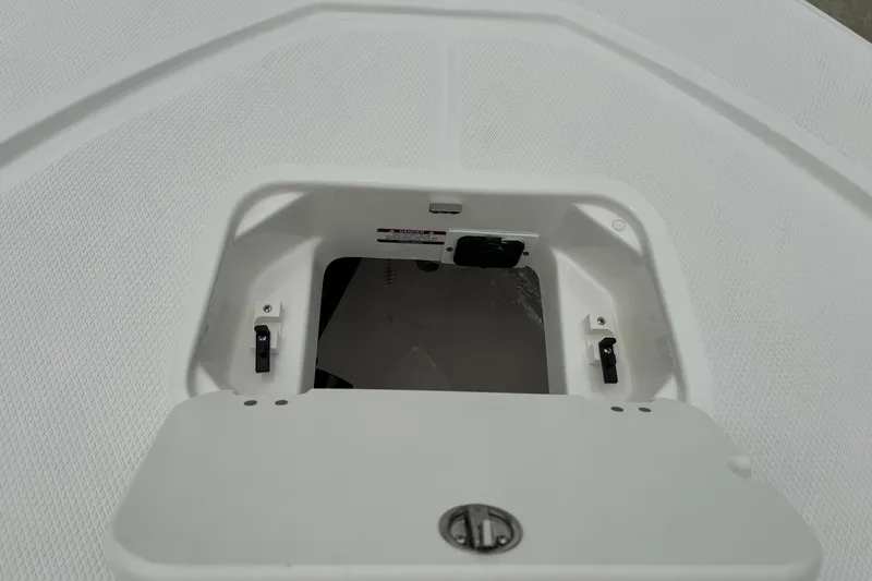 Slide: The Image of Hatch compartment of 2026 Robalo 206 Cayman boat, open and empty. - 20