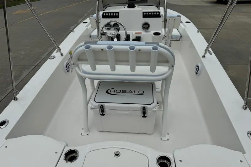 Slide: The Image of 2026 Robalo 206 Cayman boat interior with steering console and seating. - 6