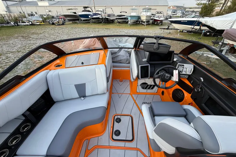 Slide: The Image of 2023 Malibu Wakesetter 23 LSV interior with modern dashboard and seating. - 6