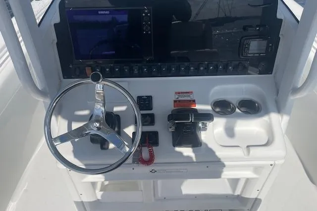 Slide: The Image of Control panel of a 2018 Sea Hunt Gamefish 27 Coffin Box boat. - 11