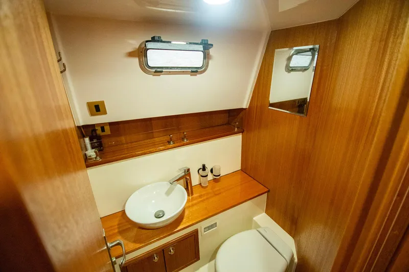 Slide: The Image of Luxurious bathroom in 2019 Monachus 45 Issa yacht with wooden accents and modern fixtures. - 11