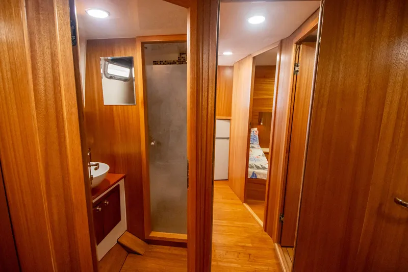 Slide: The Image of Interior of 2019 Monachus 45 Issa yacht with wooden finish and modern amenities. - 12